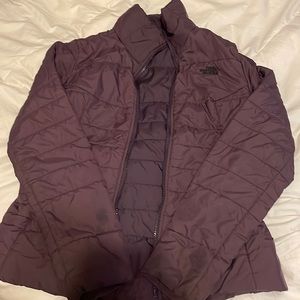 purple north face puffer jacket